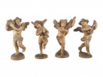 ARTE SACRA, quatro (4) querubins musicistas confeccionados em madeira entalhada a mão, em excelente estado de conservação, medindo 9cm de altura.