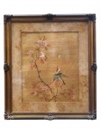 QUADRO, uma (1) pintura sobre seda, de composição oriental representando pássaro pousado em galho florido, com flores em tons rosados e carimbo/aplicação de selo no canto superior esquerdo, sinais de oxidação e manchas no pass-partout, moldura em madeira com patina dourada e ornatos nos cantos, medindo 53x46,5cm.
