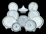 J.F. Lenz de Zell, lote com dez (10) peças confeccionadas em porcelana na tonalidade branca, decorads por espessas faixas na tonalidade verde com realces e monogramas de Barão em ouro, sendo: A) 1 sopeira, medindo 18x27,5cm, bicado na tampa, B) 1 prato fundo restaurado, medindo 23,5cm, B) 6 pratos rasos, todos com fio de cabelo e 1 bicado, medindo 23cm, C) 1 prato para sobremesa, fio de cabelo, medindo 20,5cm e D) 1 prato para pão, bicado na borda, medindo 16,5cm. Falhas na douração, vendidos no estado da foto.