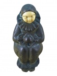 ESCULTURA, uma (1) pequena escultura confeccionado em bronze representando Pierrot com rosto em marfim, medindo 5,5cm de altura.