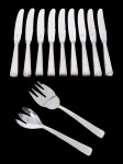 FAQUEIRO, onze (11) peças confeccionadas em aço inox com cabo cinzelado em elementos geométricos da manufatura WOLFF, sendo: A) 9 facas para jantar, B) 1 garfo para peixe e C) 1 garfo para salada.