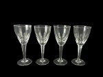 CRISTAL - Conjunto com nove (4) taças para água em cristal translúcido , lapidação dedão , hastes alongadas e bases circulares.Medida : 18,5 cm , uma delas com bicado .
