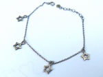 Vintage Luxo Jóias, Pulseira em Prata de Lei 925, com Estrelinhas Vazadas, sendo o fecho Bóia com parte interna em metal. Medindo 19cm. Peso total 1,45gr