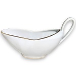 REAL - MOLHEIRA EXECUTADA EM PORCELANA ESMALTADA E VITRIFICADA, EM FORMATO NAVETE ESTILIZADO DE LINHAS FLUIDAS, APRESENTANDO ALÇA LATERAL ELEVADA, ORNADA COM FINA FILETAGEM DOURADA NAS BORDAS PERIFÉRICAS E NO ANEL DA BASE, MEDINDO 12 X 21 X 7 CM. APRESENTA MARCAS DO TEMPO, USO, PEQUENOS RISCOS, DESGASTES NA DOURAÇÃO, MANCHAS, PEQUENAS AVARIAS E/OU IMPERFEIÇÕES COMPATÍVEIS COM SUA UTILIZAÇÃO E ESTADO DE CONSERVAÇÃO, CONFORME FOTOS EXTRAS.