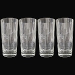 CONJUNTO DE COPOS PARA LONG DRINK EXECUTADO EM CRISTAL, DE FORMATO CILÍNDRICO DE LINHAS DIRETAS, APRESENTANDO CORPO RICAMENTE ORNADO COM LAPIDAÇÃO SATINADA EM MOTIVOS FITOMÓRFICOS DE RAMAGENS E FLORES ENTRELAÇADAS POR DELICADOS SULCOS E FRISOS VERTICAIS, ASSENTADO SOBRE BASE CIRCULAR ESPESSA E MACIÇA, COMPOSTO POR QUATRO PEÇAS, MEDINDO 13 X 6,5 CM CADA. APRESENTAM MARCAS DO TEMPO, USO, PEQUENOS RISCOS, MANCHAS, PEQUENOS DESGASTES E/OU IMPERFEIÇÕES COMPATÍVEIS COM SUA UTILIZAÇÃO E ESTADO DE CONSERVAÇÃO, CONFORME FOTOS EXTRAS.