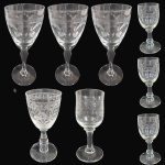 CONJUNTO DE TAÇAS EXECUTADO EM DEMI-CRISTAL FINAMENTE LAPIDADO, MARCAS, MODELOS, MEDIDAS, FORMATOS, TAMANHOS, UTILIDADES E PROCEDÊNCIAS DIVERSOS, COMPOSTO POR OITO PEÇAS, SENDO: TRÊS TAÇAS LAVRADAS EM SULCOS E FRISOS, HASTE COM CABOCHÃO SOB BASE CIRCULAR, MEDINDO 7 X 3 CM CADA; TRÊS TAÇAS, AO GOSTO SAINT LOUIS, LAVRADA EM RENDILHADOS E ESPIRAIS, HASTE BALAUSTRADA SOB BASE CIRCULAR, MEDINDO 12,5 X 5 CM CADA; TAÇA, AO GOSTO SAINT LOUIS, LAVRADA EM RENDILHADOS E ELEMENTOS FITOMÓRFICOS, HASTE COM CABOCHÃO SOB BASE CIRCULAR, MEDINDO 9,5 X 4,5 CM E TAÇA, AO GOSTO SAINT LOUIS, LAVRADA EM RENDILHADOS E ESPIRAIS, HASTE SOB BASE CIRCULAR, MEDINDO 9,5 X 4 CM. APRESENTAM MARCAS DO TEMPO, USO, PEQUENOS RISCOS, MANCHAS, PEQUENOS DESGASTES E/OU IMPERFEIÇÕES COMPATÍVEIS COM SUA UTILIZAÇÃO E ESTADO DE CONSERVAÇÃO, CONFORME FOTOS EXTRAS.