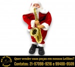 BONECO EXECUTADO EM MATERIAIS DIVERSOS, REPRESENTANDO PAPAI NOEL, TRAJANDO VESTIMENTAS TRADICIONAIS EM VELUDO VERMELHO COM ACABAMENTO EM PELÚCIA BRANCA E CINTO PRETO, SEGURANDO SAXOFONE EM MATERIL PLÁSTICO CROMADO, ASSENTADO SOBRE BASE COM SAPATOS PRETOS, MEDINDO 60 X 30 CM. APRESENTA MARCAS DO TEMPO, USO E PEQUENAS IMPERFEIÇÕES SUPERFICIAIS COMPATÍVEIS COM SUA UTILIZAÇÃO E ESTADO DE CONSERVAÇÃO, CONFORME FOTOS EXTRAS. ESCLAREÇA TODAS AS DÚVIDAS ANTES DE EFETUAR SEU LANCE, QUE SERÁ CONSIDERADO IRREVOGÁVEL E IRRETRATÁVEL. CONSULTE PREVIAMENTE OS TERMOS E CONDIÇÕES DISPONÍVEIS NO SITE. CONTATO (21) 98264-3000.
