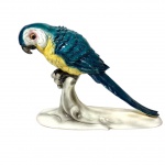 HEINRICH PORZELLAN - ALEMANHA - ESCULTURA  CONFECCIONADA CONFECCIONADA EM PORCELANA  REPRESENTANDO PÁSSARO. MARCAS DE RESTAURO NA PARTE INFERIOR MEDIDAS: 30 X 10 X 40 CM