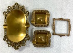 3 CINZEIROS EM BRONZE E 1 MOLDURA. MEDIDAS: MAIOR 18 X 10 CM / MENOR 8 X 7 CM