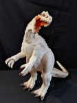 BRINQUEDO -Um antigo Dinossauro, emburrachado, medindo 42x 60x25 cm, em perfeito estado.