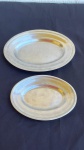 DIVERSOS - Par de travessas em aço inox com uma delas medindo 20,5x15cm e a outra 25,5x19,5cm. com marcas de uso.