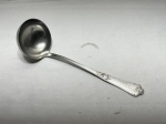 Concha de feijão em aço inox Hercules, modelo Classique, monogramado "LL". Medindo 29cm de comprimento.