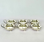 Conj. com 6 (seis) Taças baixas para sorvete em metal espessurado à prata, alça lisa e pés em bola, med. 8,5cm de diâmetro. Apresenta desgaste.