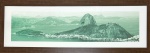 Fotografia decorativa do Pão de Açúcar em tons de verde com fundo branco e moldura em madeira escura, med.32X133cm, com moldura em madeira e proteção de vidro med. 57X161cm  