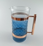 Belissima Jarra para Agua/suco , no tom azul mesclado e pega em metal . Medindo : 22x13 cm .