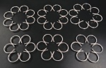 Seis suportes para travessas em metal folheado a prata no formato de flor. Sem uso.  Med. 18.5 cm cada.