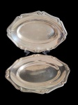 Fracalanza - Duas travessas em metal espessurado a prata. Medindo: 34 x 23 x 3 cm .