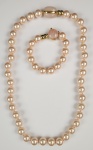 Francesa Romana. Conjunto de colar e pulseira. Marcado. Acompanha bolsinha da marca. 60 cm e 20 cm.