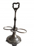 CHRISTOFLE - Suporte para galheteiro, produzido em metal espessurado a prata. Medindo: 27,5 x 17 x 10 cm.