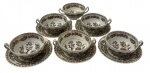 Seis consumes com seus respectivos pires em porcelana inglesa na cor branca, esmaltado e policromado com decoração de arvores, flores e filetes dourados. Manufatura ao verso.