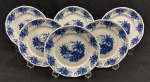 Schmidt. Seis pratos para sobremesa em porcelana nacional, esmaltado com decoração de paisagens em tom de azul, sobre fundo branco. 19 cm.