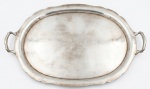Grande bandeja em prata  mexicana, teor 925, marca do prateiro JMS. Borda e alças com recortes sinuosos. 65 x 43 cm. Peso : 2545g
