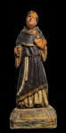 Escultura em madeira de Santo Antonio. Med.: 13,5x11x12,5cm Obs: peça vendida no estado. Com assinatura.