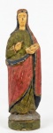 Escultura sacra representando a mártir Santa Luzia esculpida em madeira policromada. Med.:21x3,5x6cm.