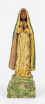Escultura de Nossa Senhora de Guadalupe esculpida em madeira policromada. Med.:15x3,5x5cm.