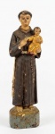 Escultura de Santo Antônio esculpida em madeira. Med.: 20x3,5x5,5cm