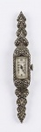 Relógio feminino art déco em prata 935 cravejado de marcassitas. Marca suiça - EXTRA.  7,5 cm. Peso bruto: 12.8g. Falta a corroa.
