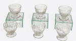 BACCARAT - Conjunto com 6 taças para vinho branco em cristal francês, haste curta e lapidação de facetas contínuas, modelo CHARLES  com carimbo da cristaleria na base de apenas 5 dos copos. 6,5 x 7,5 cm.