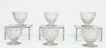 BACCARAT - Conjunto com 6 taças para vinho do porto em cristal francês, haste curta e lapidação de facetas contínuas, modelo CHARLES  com carimbo da cristaleria na base. 6 x 6 cm.