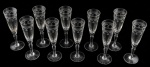 Conjunto com 10 taças para vinho tinto em cristal europeu com lapidação em baixo relevo, decoração floral interligadas por arcos, frisos e serrilhados ao gosto Saint-Louis. 19,5 x 5 cm.