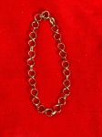 Pulseira em ouro 18k com elos alternados com o simbolo do infinito. 18 cm. 3.9g.