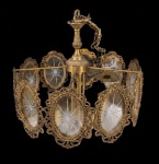 Lustre vintage em bronze com paineis de vidro iridiscentes lapidados no feitio oval.  41 x 38cm.