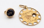 Sucata de ouro. 0,6g, o peso bruto.