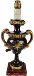 Antigo tocheiro para altar de madeira entalhada em formato de ânfora com vestígios de policromia. Apresenta símbolo da eucaristia . Medidas: 38X18cm