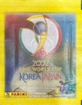 2002 Vintage - Envelope de Figurinhas Copa do Mundo 2002 - Reimpressão Colecionável. Reviva a magia da Copa do Mundo de 1994 com este envelope de figurinhas reimpresso com alta fidelidade ao original da época! Um item perfeito para colecionadores apaixonados por futebol e nostalgia. Modelo baseado no envelope clássico da Copa de 1994 Impressão de qualidade, ideal para coleção ou decoração. Produto reimpresso, não é original da época Ótimo para completar sua coleção temática de Copas do Mundo. Tamanho aproximado: 11cm x 8cm (padrão clássico).