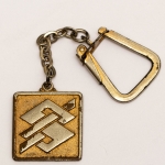 Colecionismo. Chaveiro antigo 1971, promoção do Banco do Brasil. Metal dourado, 2,5x2,5cm. Original, para colecionadores