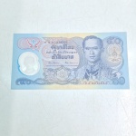 tres cedulas tailandesas de 20 baht