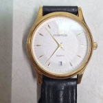 Belissimo relogio cosmos classico na cor dourada. Qualquer duvida entrar em contato pelo whatsaap: 11948723970 ou pelo nosso email: loucoporantiguidades@gmail.com. OBS: A sua participação em nosso leilão ajuda em causas animais.