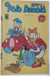 Gibi Antigo O Pato Donald  Edição Nº 1296 (Anos 70)  Editora AbrilRevista quinzenal clássica em quadrinhos do universo de Walt Disney. Esta edição traz histórias nostálgicas e raras da época de ouro dos quadrinhos no Brasil, incluindo tramas com o Pato Donald, Margarida e participações especiais de outros personagens do núcleo de Patópolis. A capa destaca uma divertida arte com o Donald, a Margarida e o icônico carro "313"