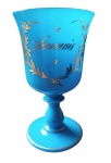 Taça em opalina azul Baccarat, França século XIX, com decoração em dourado em frisos e guirlandas ao centro entre duas estrelas a inscrição "Souvenir" , 15 CM