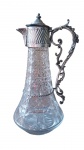 Jarra em cristal lapidada,  possivelmente Baccarat ou Val Saint  Lambert, fim do século XIX, com bela armação no bocal e nas alças em metal banhado a prata. 27 x 13 cm 