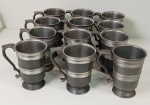 12 copos de chopp em estanho   com alça sem carimbo. Mede: 13 cm .No estado 
