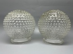 Globos em demi cristal, relevos esféricos, lote com 2 unidades, medidas 16x10 cm. Apresentam marcas do tempo, uso e bicados.