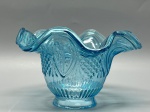 Cúpula em demi cristal translúcido na cor azul claro, com rica decoração em relevo geométrico e de losangos, e borda ondulada plissada, medidas 9x5,5x15,5 cm. Apresenta marcas do tempo, uso e bicados.