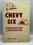 AUTOMOBILISMO HISTÓRICO  CHEVY SIX: CONSTRUCTION & RESTORATION (1929-1940). POST-ERA BOOKS. Raro e valioso manual técnico de autoria do renomado engenheiro automobilístico Victor W. Pagé, inteiramente dedicado à mecânica, montagem e restauração dos lendários motores e veículos Chevrolet de 6 cilindros produzidos entre 1929 e 1940. A obra funciona como um guia definitivo de época, repleto de esquemas, ilustrações detalhadas e especificações originais de fábrica para carros e caminhões da clássica linha "Chevy Six". Item indispensável para antigomobilistas, restauradores, mecânicos especializados e colecionadores da marca Chevrolet. Apresenta encadernação original em capa dura com textura sintética marfim, exibindo marcas naturais de tempo e leve sujidade pelo manuseio.