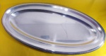 Meridional EPS: Travessa rasa oval com borda filetada medindo 61x29 cm.